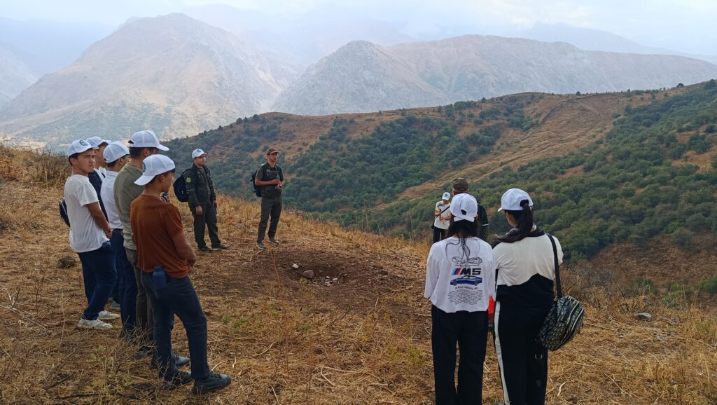 Pskem school students at the landslide site